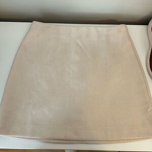 Tan suede mini skirt.